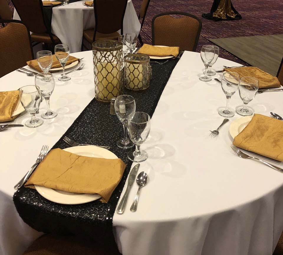 gold and black theme tablescape at bear river